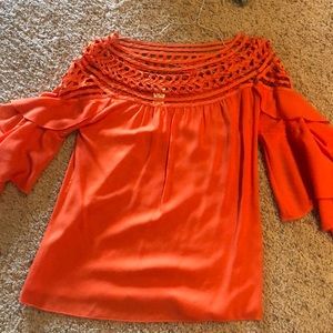 Orange ruffle top